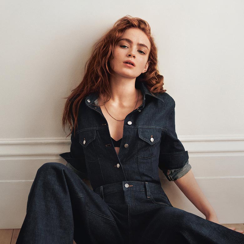Sadie Sink posing in Denim Trucker Shirt