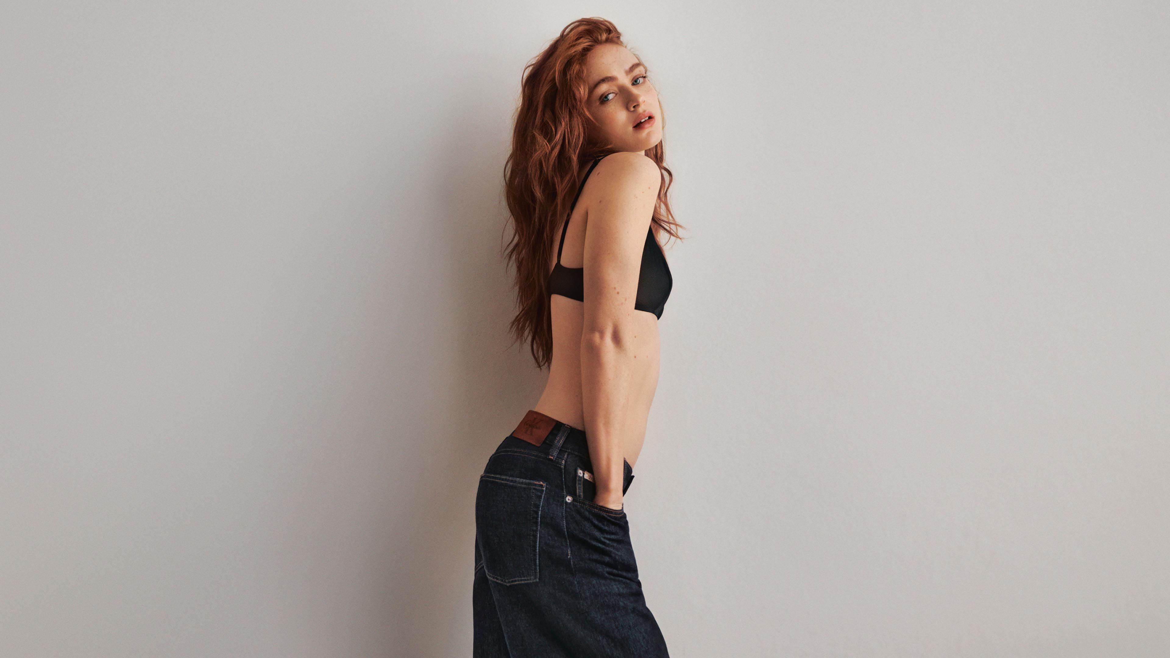 Sadie Sink posing in the Low Rise Baggy Jean