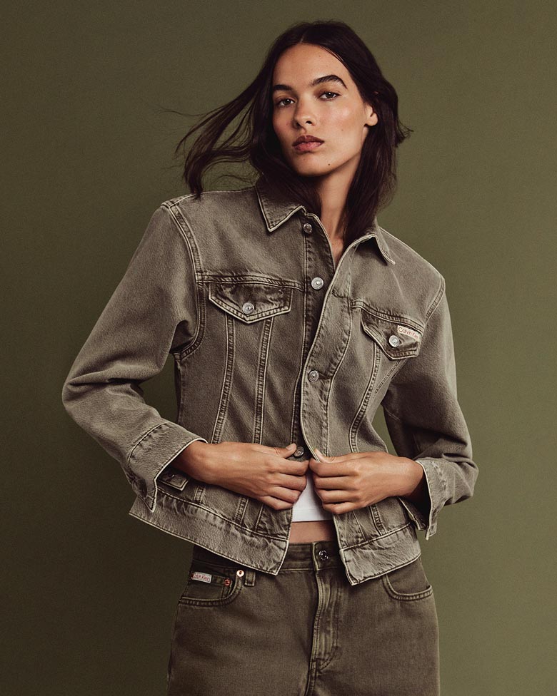 Grace Valentine posing in the Cinched Peplum Denim Jacket