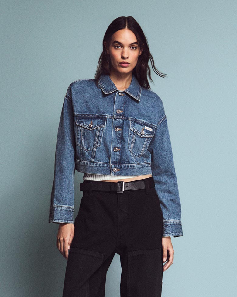 Grace Valentine posing in the Cropped Denim Trucker Jacket