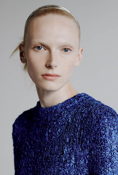 Model wearing a blue textured top