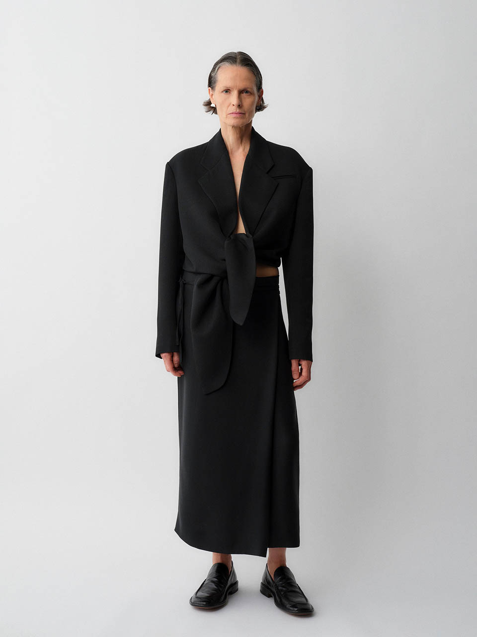 Model posing in Calvin Klein Collection Apparel