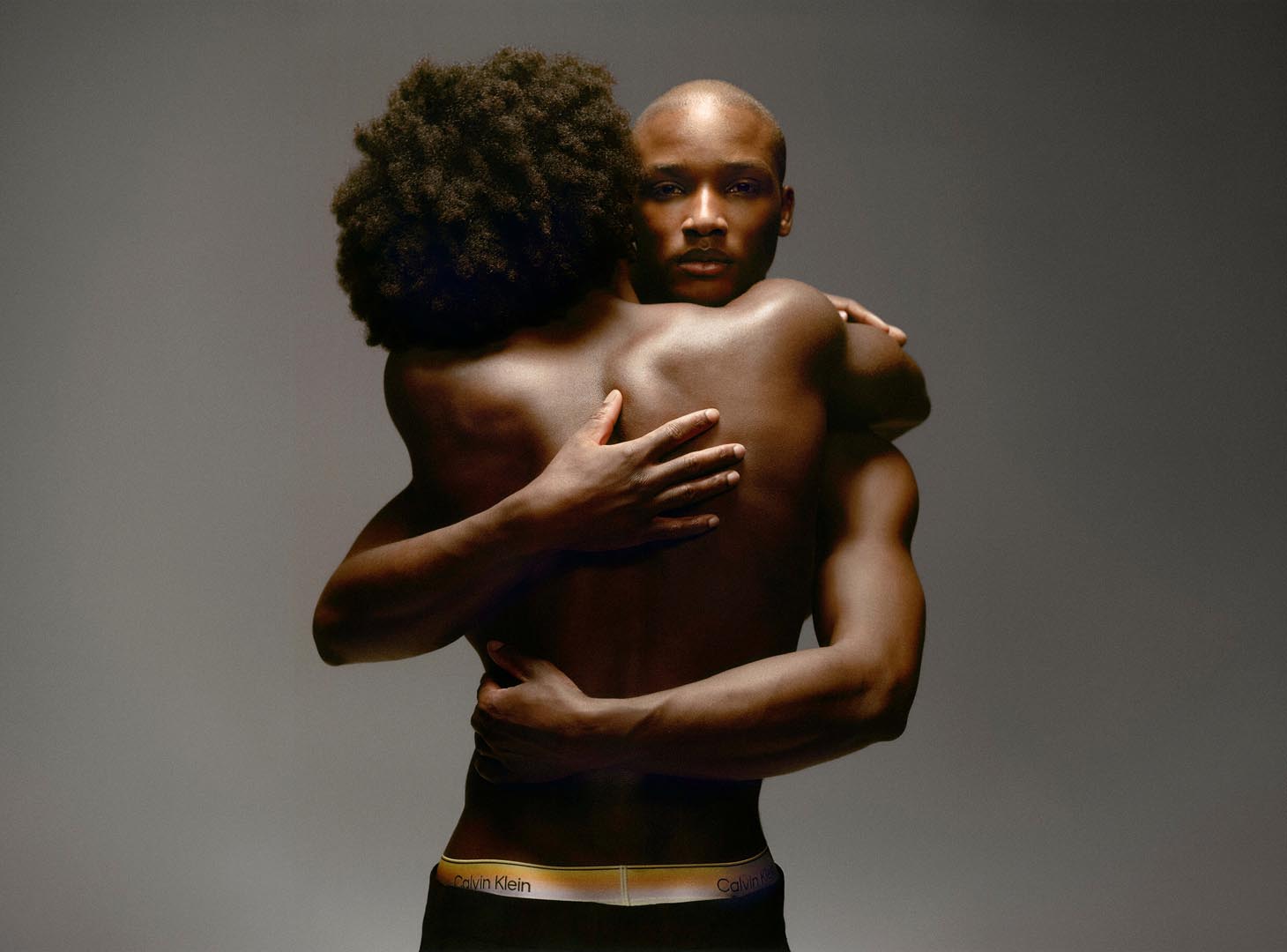Models hugging in Calvin Klein Underwear