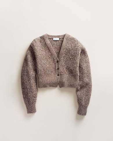 Still life image of a cardigan sweater