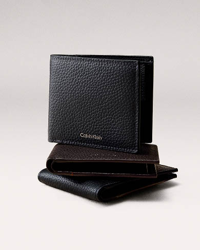 Still life image of a stack of wallets