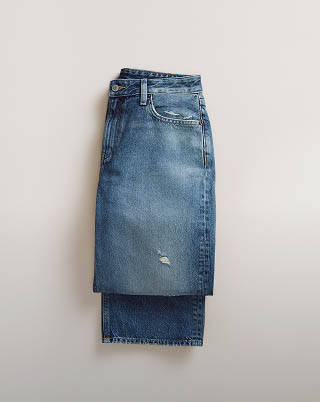 Still life image of 90s straight jeans