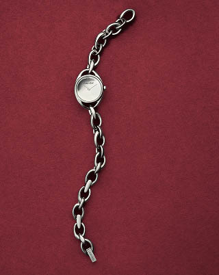 Still life image of a silver bracelet watch