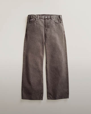 Still life image of black baggy jeans
