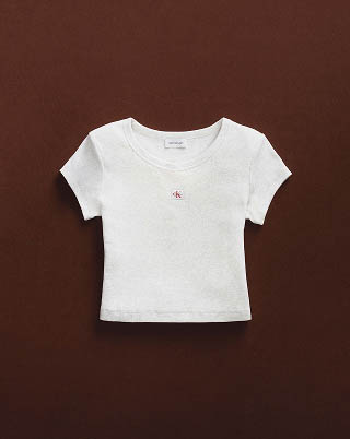 Still life image of a white baby t-shirt