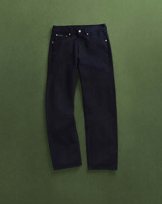 Still life image of black 90s straight jeans