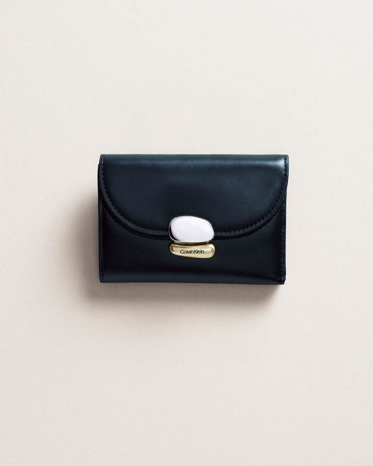 Still life image of a black wallet
